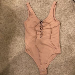 Blush lace up bodysuit